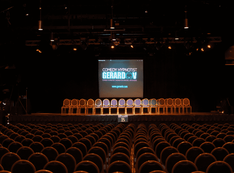 Comedy Hypnotist Gerard V - empty stage at large venue