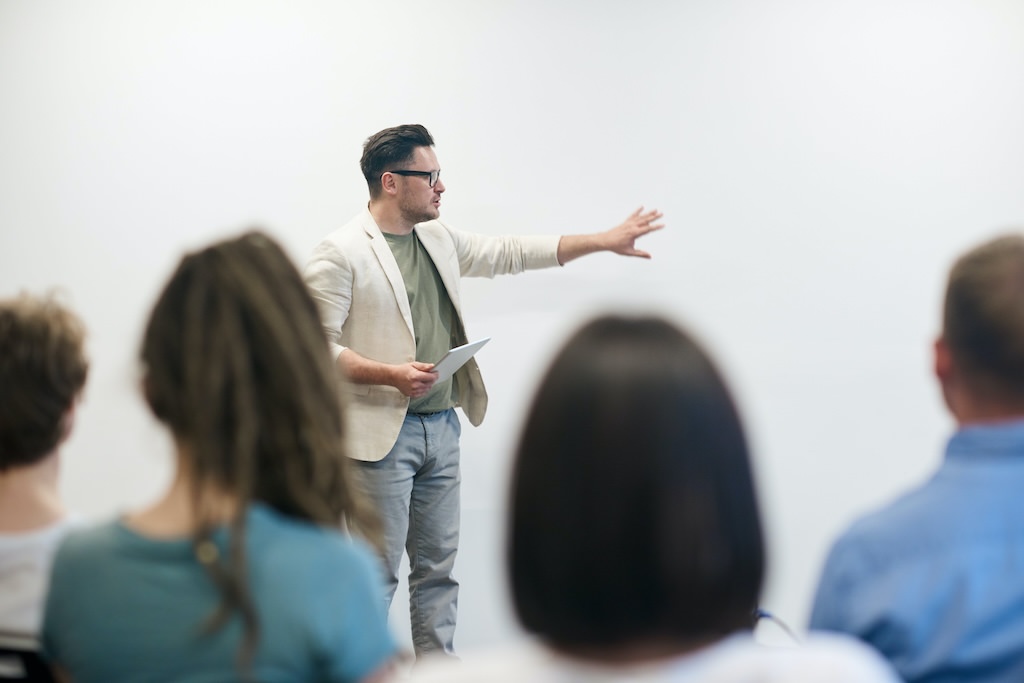 Man teaching others
