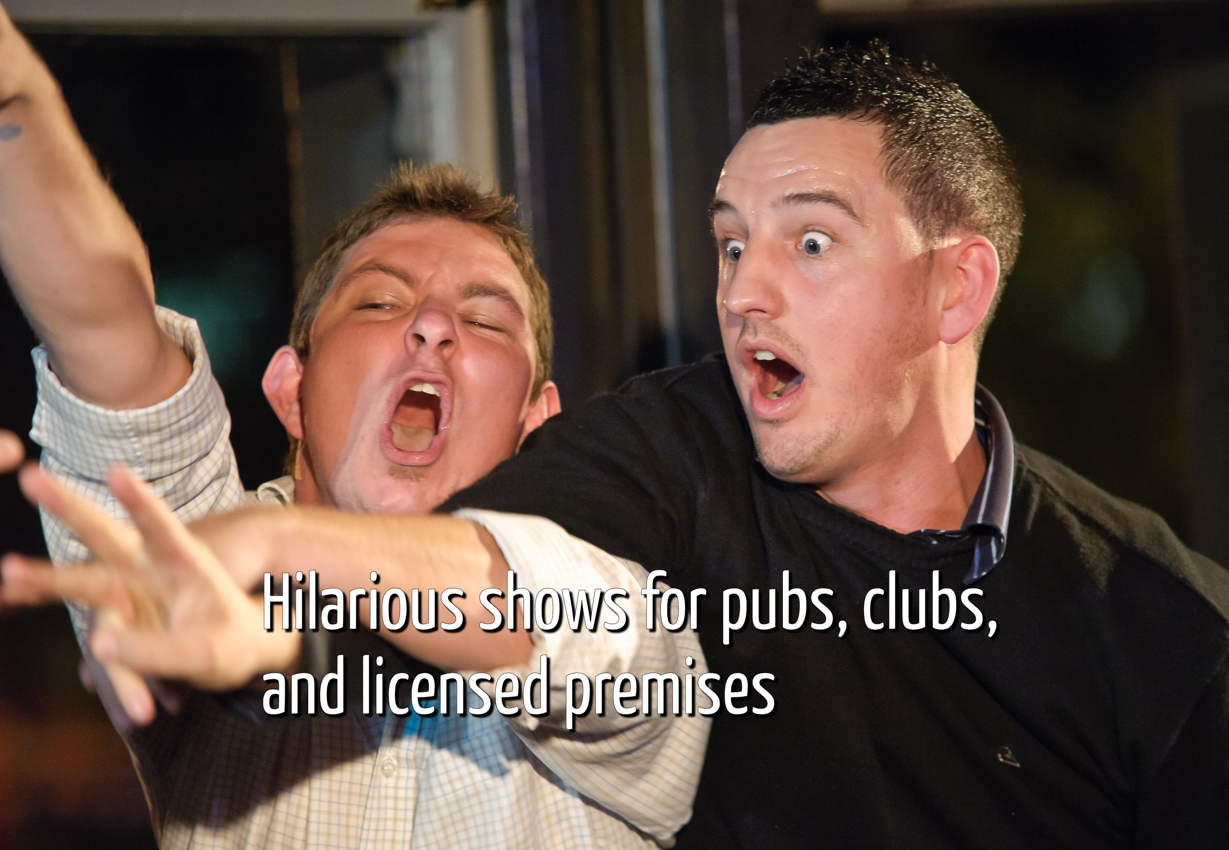 Two guys hypnotised on stage act out a skit